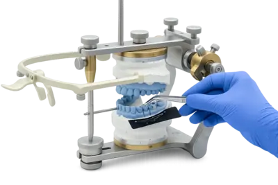 Исследование движений челюсти на артикуляторе для точной диагностики прикуса